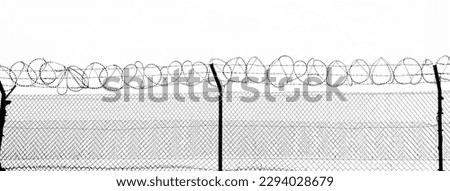 A fragment of a fence with coils of barbed wire isolated on white background. black silhouette of Barbed wire on an iron fence. Against white backdrop.  Foto stock © 