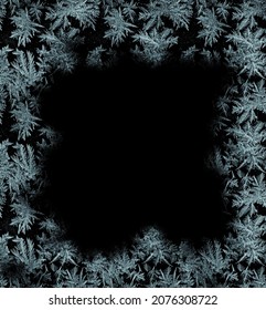 A Frame Of A Frosty Pattern Of Ice Crystals On A Black Background. A Frame With An Abstract Ice Structure Allows You To Apply Or Add A Frost Effect. Frost On The Glass, Freezing Effect