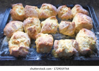 Fresh biscuits on a pan with natural lighting.