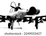 Front left view of A-10 model parking with full weapons load, internal ladder pull downed and open canopy.