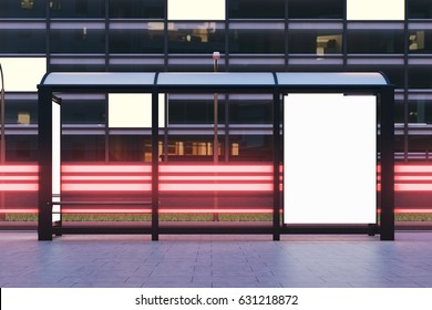 Front View Of A Bus Stop With Two Blank Vertical Billboards Standing In The Night Street Near A Building With Glowing Windows In The Background. 3d Rendering, Mock Up