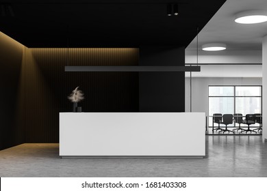 Front view of comfortable reception counter standing in modern office lobby with white and black walls and conference room in background. 3d rendering