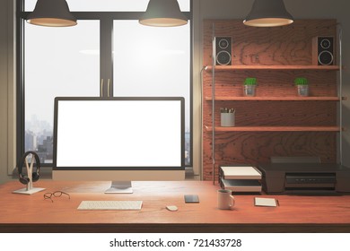 Front view of creative designer desk with empty white computer monitor, items on shelf, coffee cup, other objects and city view. Mock up, 3D Rendering 
