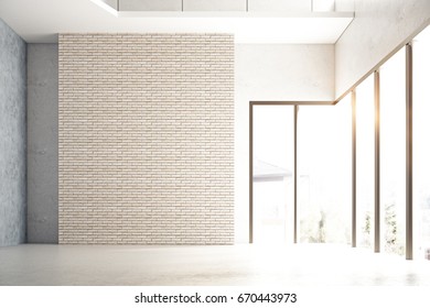 Front view of empty brick wall in concrete interior with city view and sunlight. Mock up, 3D Rendering