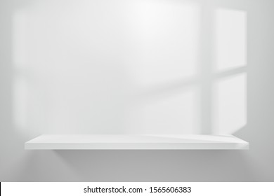 Front view of empty shelf on white table showcase and wall background with natural window light. Display of backdrop shelves for showing minimal concept. Realistic 3D render.