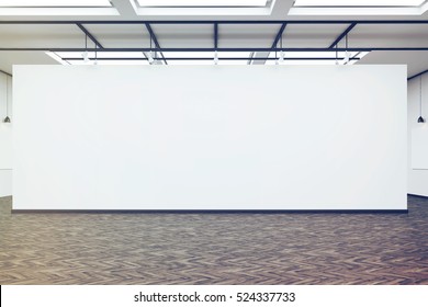 Front View Of A Large Blank White Wall In An Art Gallery. Dark Wood Floor. Concept Of Exhibition. 3d Rendering. Mock Up. Toned Image