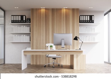 Front View Of An Office Of A Head Of A Company With Light Wood Walls, A Panoramic Window And A Table With Computer On It. 3d Rendering. Mock Up.