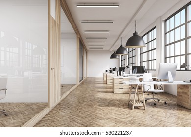 Front view of an office interior with a row of dark wood tables standing under large windows. Massive ceiling lamps. Computers. 3d rendering.