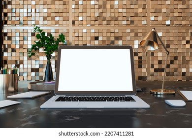 Front View On Blank Dark Modern Laptop Monitor Screen With Space For Your Logo Or Text On Dark Marble Table In Stylish Room With Golden Lamp On Mosaic Wall Background. 3D Rendering, Mock Up