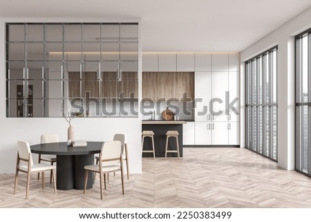 Front view on bright kitchen room interior with island, barstools, panoramic window, white wall, glass partition, table, armchairs, hardwood floor, cupboard. Concept of minimalist design. 3d rendering