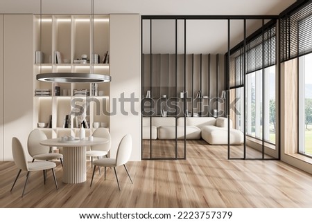Front view on bright studio room interior with dining table, chairs, sofa, white wall, oak wooden hardwood floor, panoramic window with countryside view. Concept of minimalist design. 3d rendering