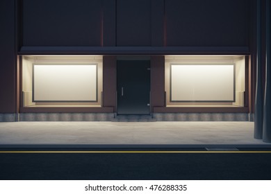 Front View Of Storefront With Two Empty Billboards At Night. Mock Up, 3D Rendering