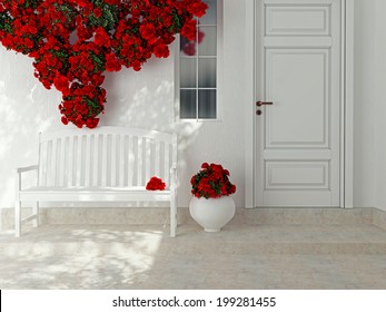 Front View Of A Wooden White Door. Beautiful Red Roses And Bench On The Porch. Exterior Of A House.