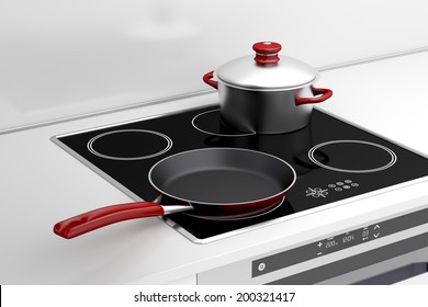 Frying pan and cooking pot at the induction stove