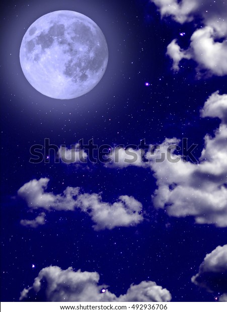 Full blue moon with star at dark clouds night\
sky background