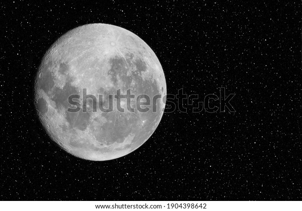 Full moon with\
galaxy and stars with copy space on the right side. Some elements\
of this image provided by\
NASA.