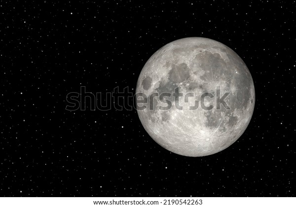 Full moon with\
galaxy and stars with copy space on the left side. Some elements of\
this image provided by\
NASA.