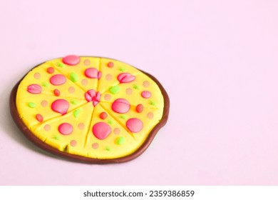 Full pizza on pink background - Powered by Shutterstock