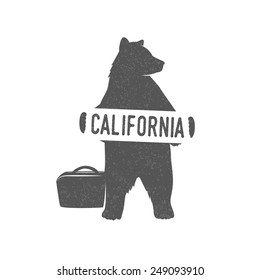 Funny hitchhiking bear with California sign