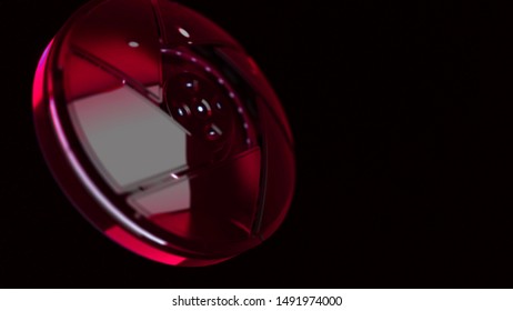 Futuristic abstraction of 3d electronic device, disintegrating into component parts on the black background. Animation. Central sight of wheels in technology. Subtle mechanical parts on black.