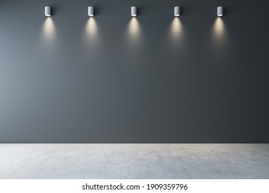 Gallery interior with ceiling lamps and blank gray wall. Gallery concept. Mock up, 3D Rendering