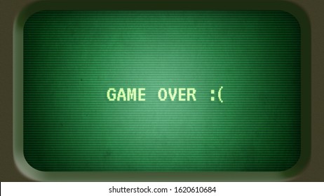 Game Over Message With Sad Face On Old Green Computer Terminal Screen With Frame