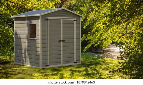 Garden Shed On Nature Green Background. Gray Color Gardening Tools Storage Shed In The House Backyard. 3d Illustration