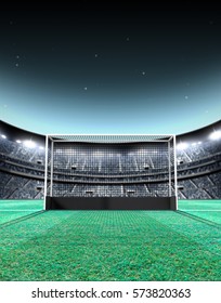 A Generic Seated Lawn Hockey Stadium With A Netted Goal On A Green Grass Pitch At Night Under Illuminated Floodlights - 3D Render