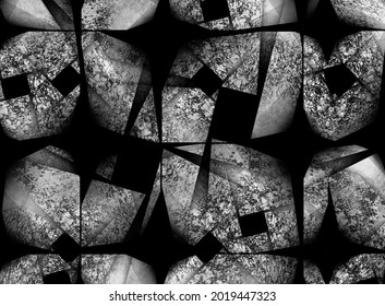 Geometrically constructed and textured boulders with notches and recesses, black and white
