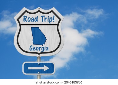 Georgia Road Trip Highway Sign, Georgia Map And Text Road Trip On A Highway Sign With Sky Background 3D Illustration 