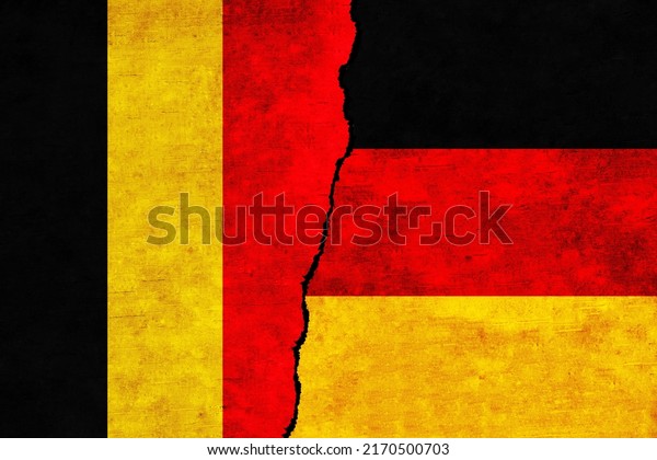 Germany and Belgium painted flags on a wall\
with a crack. Belgium and Germany relations. Germany and Belgium\
flags together\
