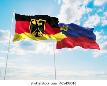 Germany & Liechtenstein Flags are waving in the sky