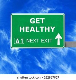 GET HEALTHY Road Sign Against Clear Blue Sky