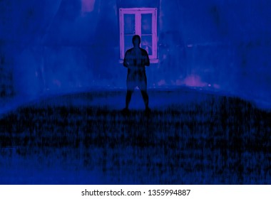 Ghostly figure in an empty room. Light painting photography.