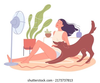 Girl And Her Dog Are Chilling At Home By The Fan