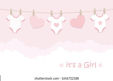 its a girl welcome greeting card for childbirth with hanging hearts and bodysuits illustration
