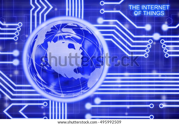 Glass earth embedded in a circuit\
in front of a glowing network internet of things iot\
concept