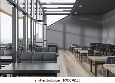 Glass roof cafe with a terrace. Dark gray walls, a wooden floor and tables with black sofas near them. 3d rendering mock up