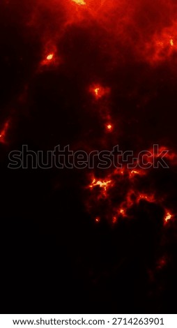 Glowing fire ashes and ember particles floating on dark background. Abstract fiery texture for cinematic compositions, fantasy scenes, dramatic visuals and vertical overlay design.