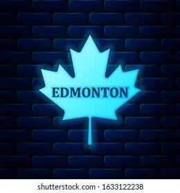 Glowing Neon Canadian Maple Leaf With City Name Edmonton Icon Isolated On Brick Wall Background