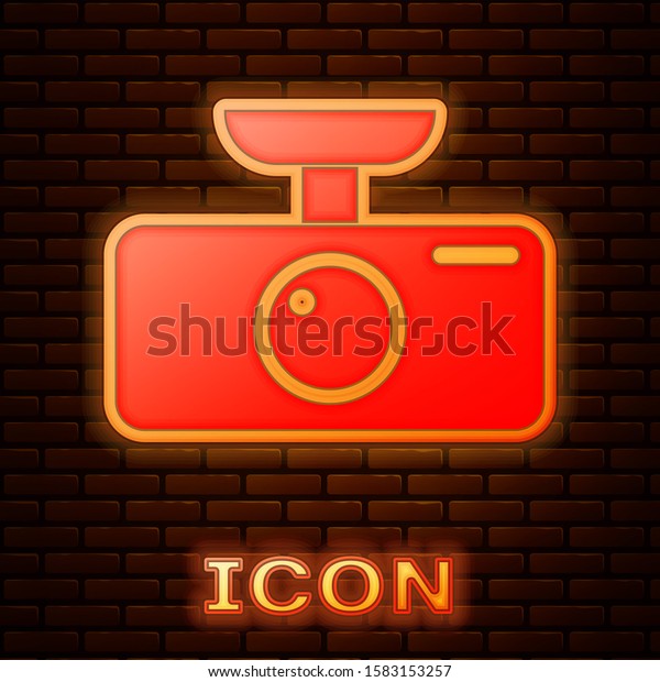 Glowing neon Car DVR icon isolated\
on brick wall background. Car digital video recorder icon. \
