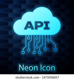 Glowing Neon Cloud Api Interface Icon Isolated On Brick Wall Background. Application Programming Interface API Technology. Software Integration