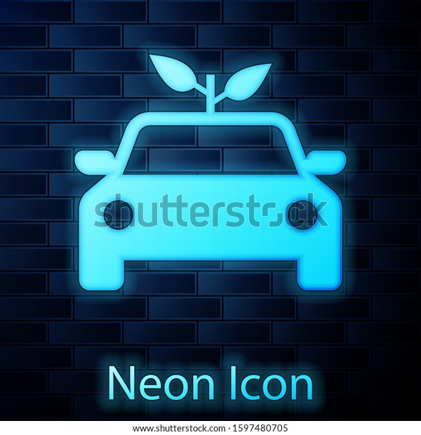 Glowing neon Eco\
car concept drive with leaf icon isolated on brick wall background.\
Green energy car symbol.\
