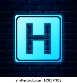 Glowing Neon Hospital Sign Icon Isolated On Brick Wall Background