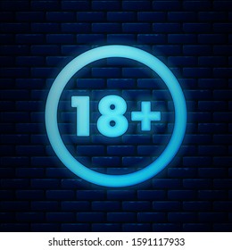 Glowing neon Plus 18 movie icon isolated on brick wall background. Adult content. Under 18 years sign.  