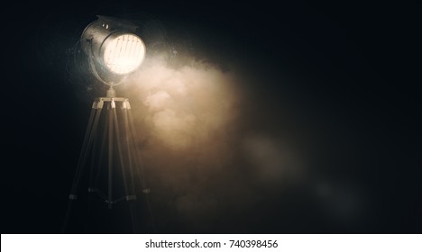 Glowing spotlight against abstract grunge wall with smoke and copy space. Event concept. 3D Rendeirng 