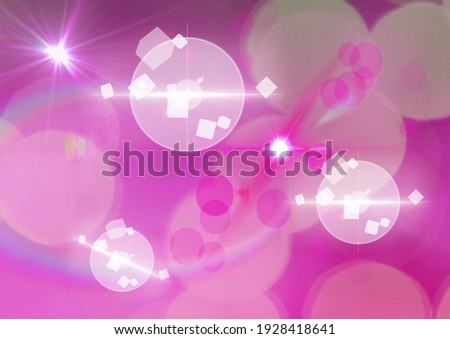 Glowing white and pink spots of light and light trails over pink background. light and colour concept digitally generated image.