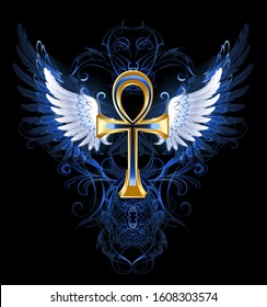 gold ankh with white wings on a dark blue patterned background.
