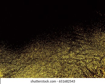 Gold And Black Colors Designed Rough Texture Blur Grain Background