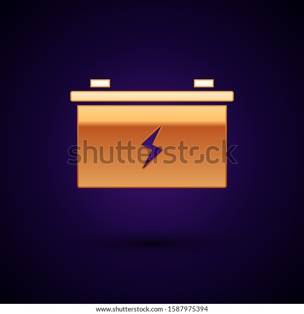 Gold Car battery icon isolated on dark blue background.\
Accumulator battery energy power and electricity accumulator\
battery.  